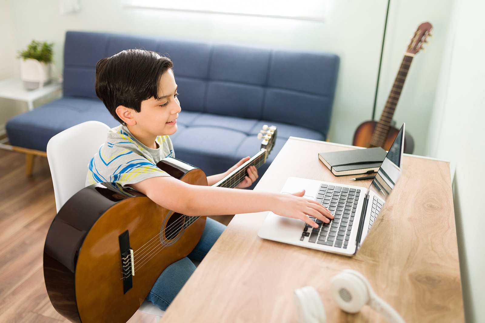 Child combining music and technology learning